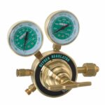Brass oxygen regulator with dual pressure gauges and adjustment knob for precise gas flow control.